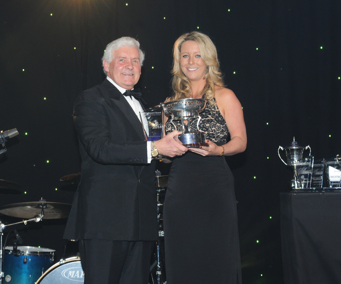 Julie Collier receives the George Ford Award for Services to Retired Greyhounds from Andrew Higgins