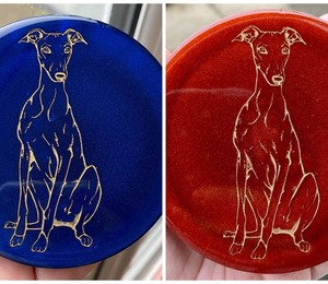 Coasters containing images of greyhounds