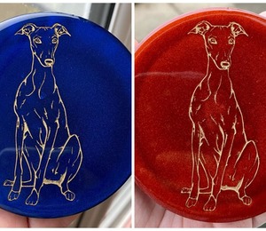 Coasters containing images of greyhounds